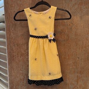 Seersucker Yellow Bee Kids Dress with embroidered Bees.